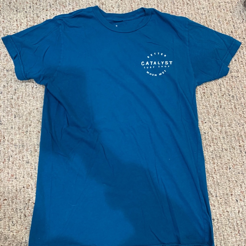 Small surf shop shirt